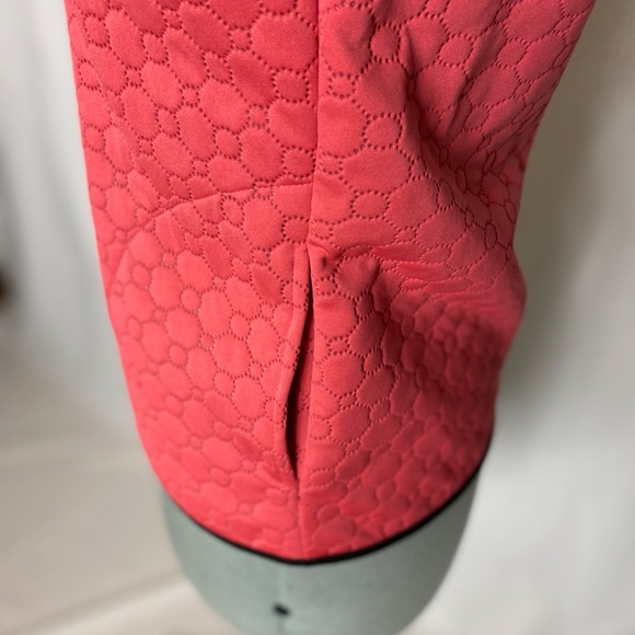 Swing Golf Vest in coral. - Picture 5 of 11